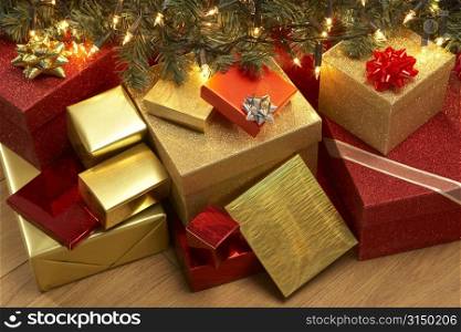 Group Of Christmas Presents Under Tree