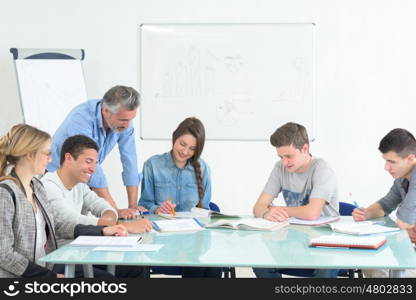 group of colleagues having a meeting at office