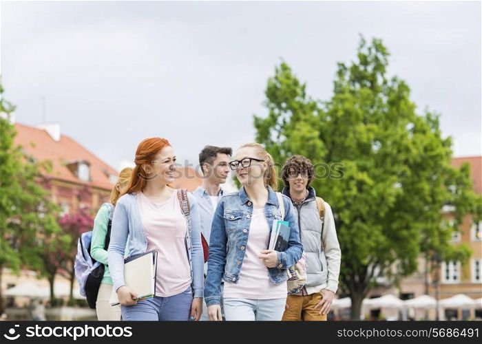 Group of college friends walking outdoors