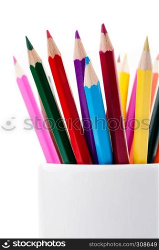 Group of color pencils in a white cup, white background, isolated. Color pencils