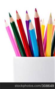 Group of color pencils in a white cup, white background, isolated. Color pencils