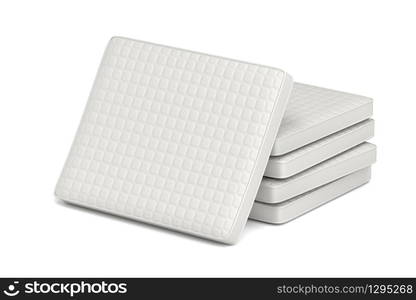 Group of comfortable mattresses on white background