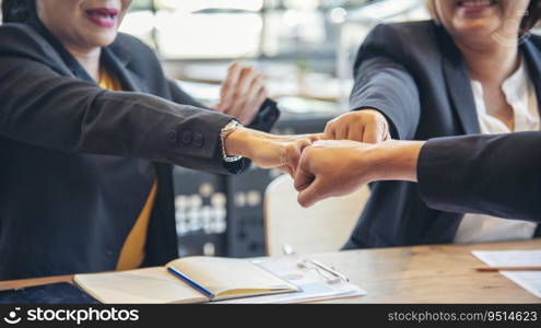 Group of diversity people fist bump holding hands together power of tag team. Teamwork Multiethnic people group working togetherness. Business people team holding hands successful. Business meeting