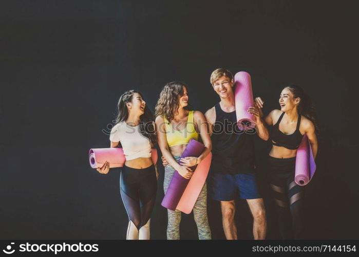 Group of diversity sporty people standing and talking with happiness motion, wearing sportswear bra and pants fashion, posture position, sport club community, sports and healthcare concept