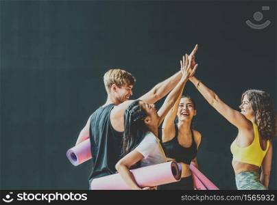 Group of diversity sporty people talking and celebrating by give me five with happiness, wearing sportswear bra and pants fashion, posture position, sport club community, sports and healthcare concept