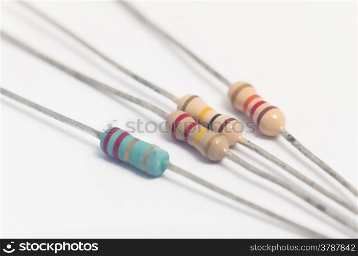 Group of electronic resistors in white background