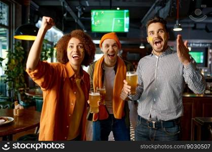 Group of emotional friends watching soccer in pub. Men and woman watching television online match and cheering for team. Rest in sports bar and beer drinking time on weekend. Group of emotional friends watching soccer in pub