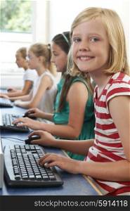 Group Of Female Elementary School Children In Computer Class