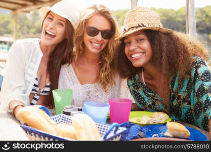 Group Of Female Friends Enjoying Lunch Outdoors