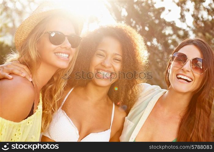 Group Of Female Friends Having Party On Beach Together