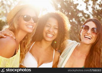 Group Of Female Friends Having Party On Beach Together
