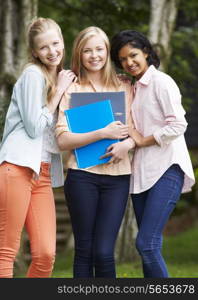 Group Of Female Teenage Students Outdoors