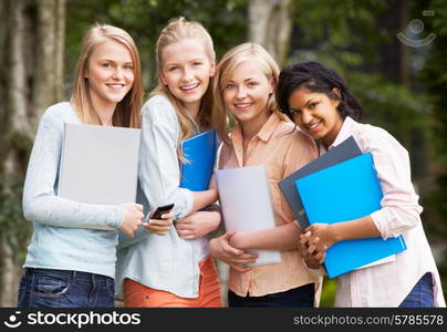 Group Of Female Teenage Students Outdoors