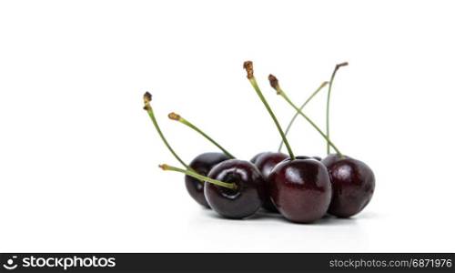 group of fresh cherry isolated on white
