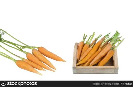 Group of fresh organic baby carrots on isolated white background