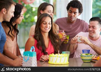 Group Of Friends Celebrating Birthday At Home