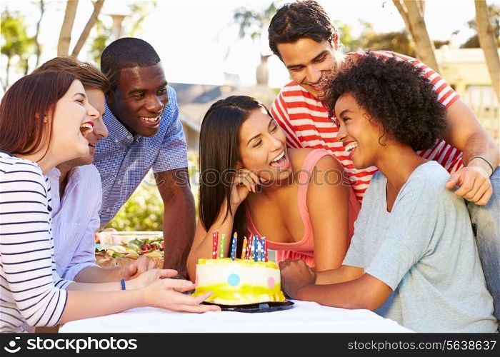 Group Of Friends Celebrating Birthday Outdoors