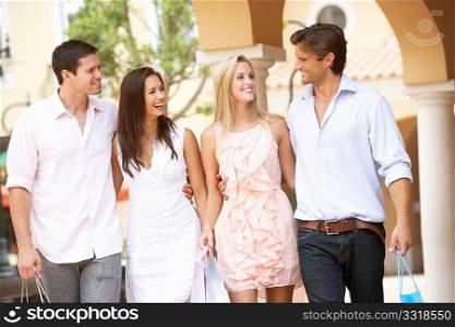 Group Of Friends Enjoying Shopping Trip Together