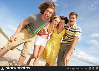 Group Of Friends Having Fun On Summer Beach