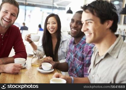 Group Of Friends Meeting In Coffee Shop