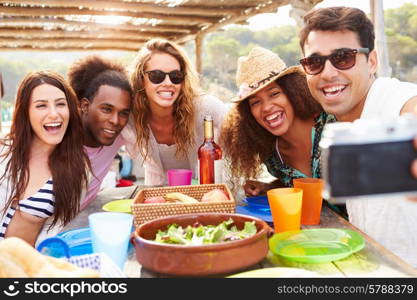 Group Of Friends Taking Selfie During Lunch Outdoors