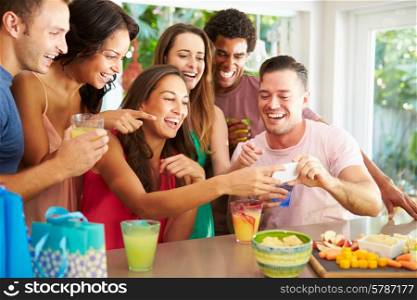 Group Of Friends Taking Selfie Whilst Celebrating Birthday
