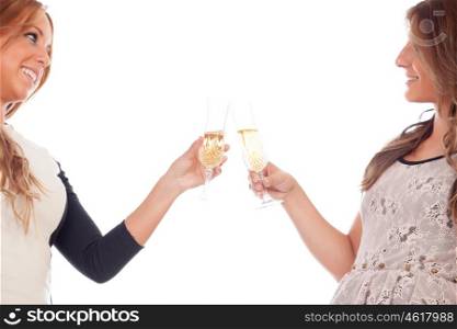 Group of friends toasting with champagne pretty in a celebration during christmas