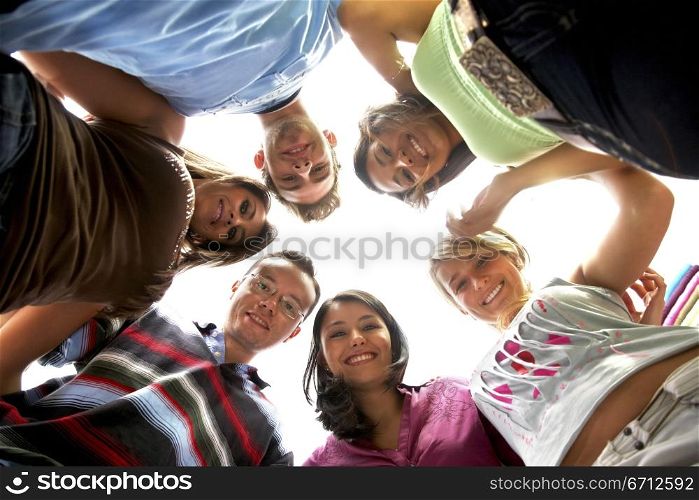 group of friends together over a white background