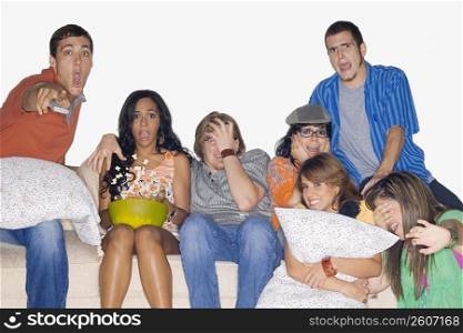 Group of friends watching television