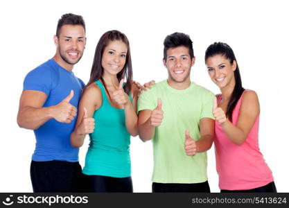 Group of friends with fitness clothes saying Ok isolated on a white background