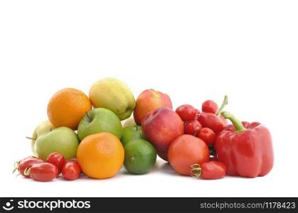 group of fruits and tomatoes on white background