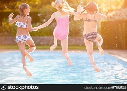 Group Of Girls Playing In Outdoor Swimming Pool