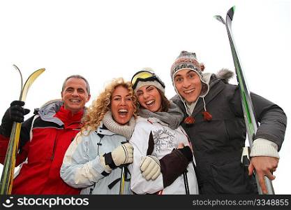 Group of happy friends in winter vacation
