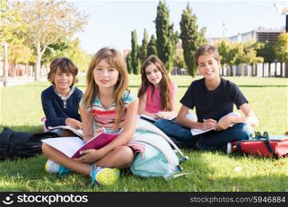 Group of happy school kids in school campus