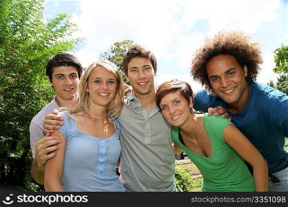Group of happy students in a park