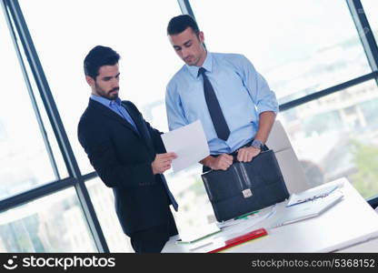 Group of happy young business people in a meeting at office