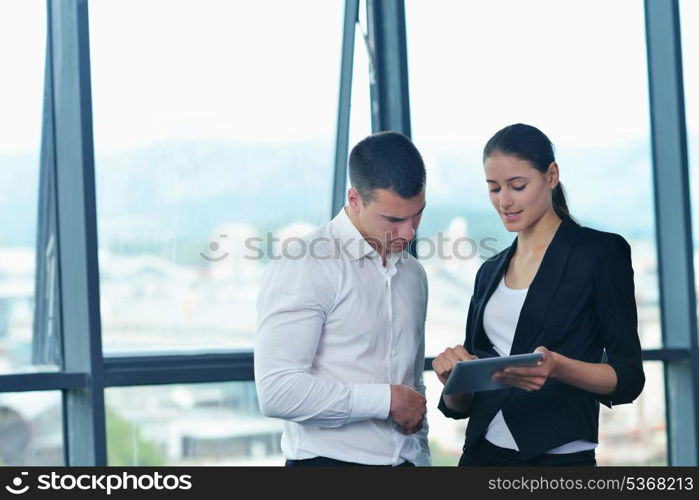 Group of happy young business people in a meeting at office