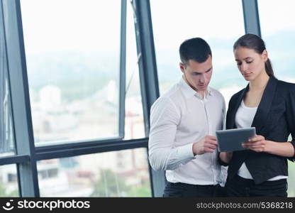 Group of happy young business people in a meeting at office