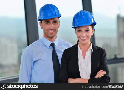 Group of happy young business people in a meeting at office