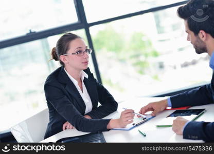 Group of happy young business people in a meeting at office