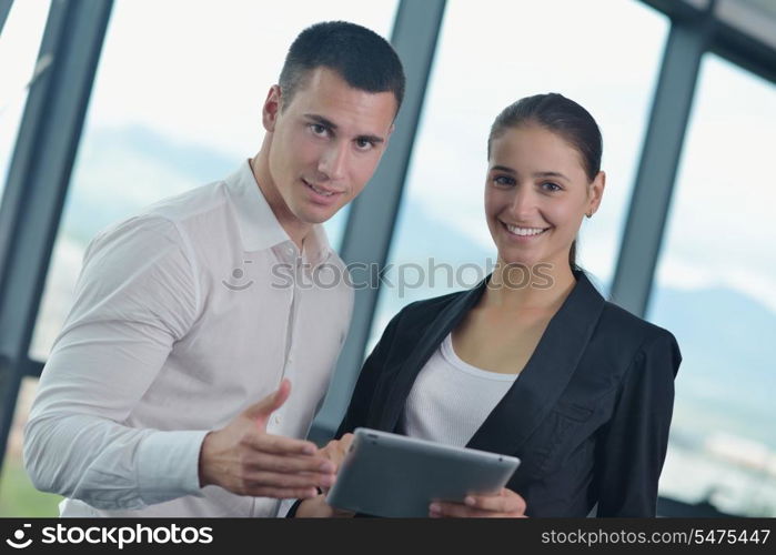 Group of happy young business people in a meeting at office