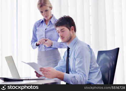 Group of happy young business people in a meeting at office