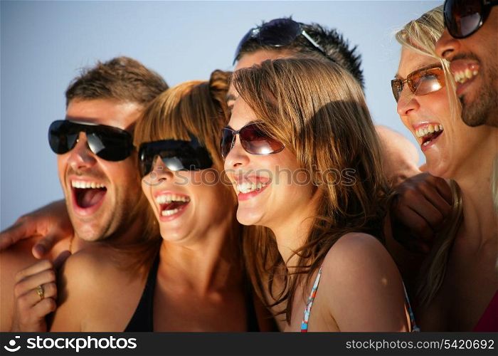 Group of happy young people on holiday