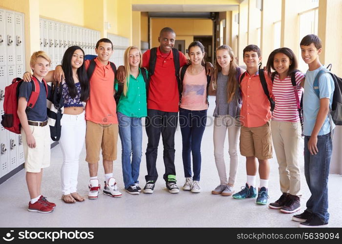 Group Of High School Students Standing In Corridor