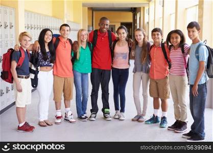 Group Of High School Students Standing In Corridor