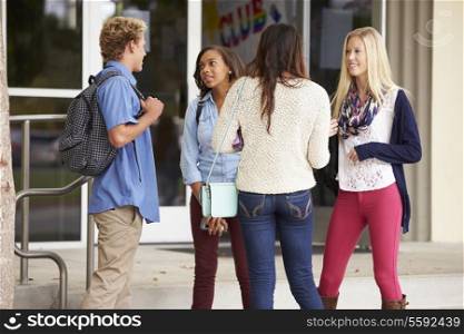 Group Of High School Students Standing Outside Building