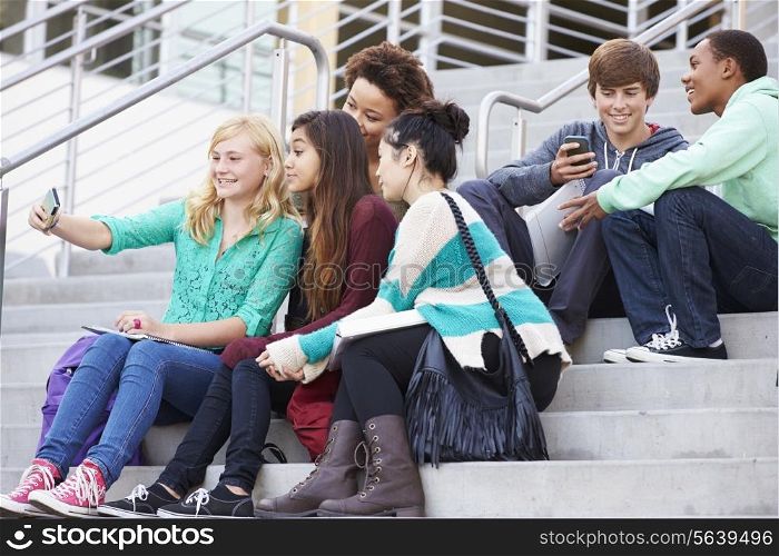 Group Of High School Students Taking Selfie Photograph