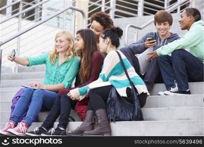 Group Of High School Students Taking Selfie Photograph