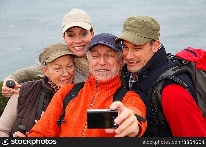 Group of hikers taking picture of themselves