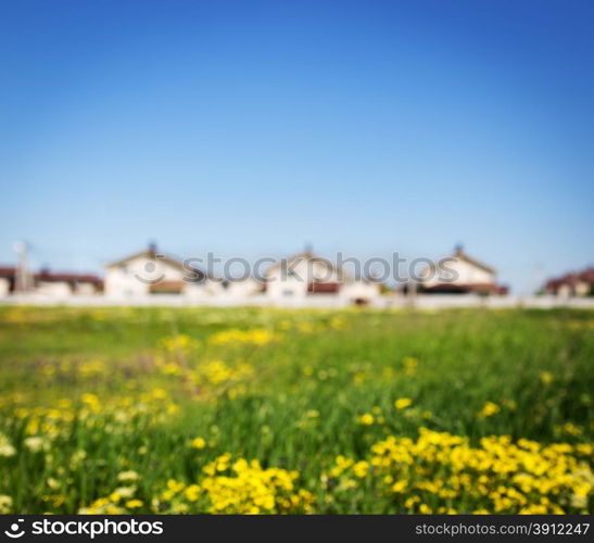 Group of houses in the countryside. Defocused photo